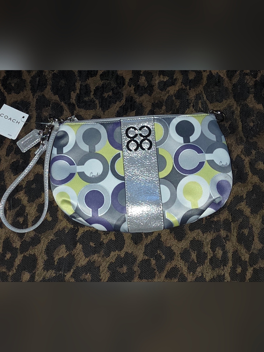 Coach Metallic Silver Wristlet with Multicolor Circle Print